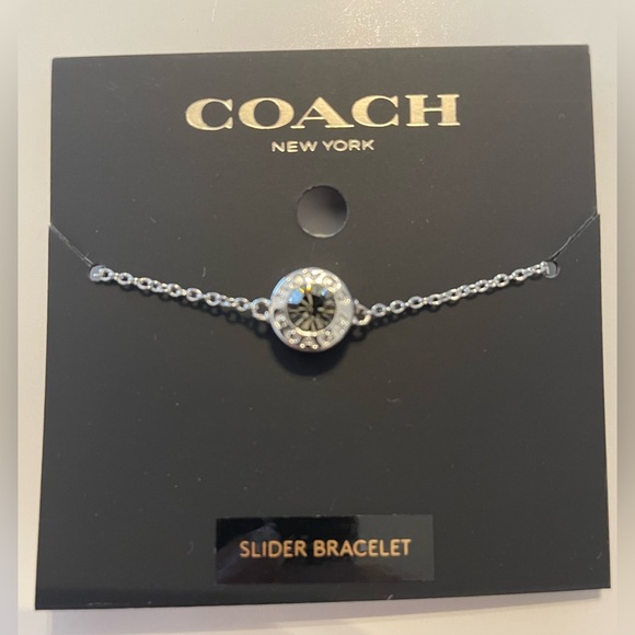 kate spade Jewelry - 167. Coach open circle silver tone Smokey stone color slider bracelet